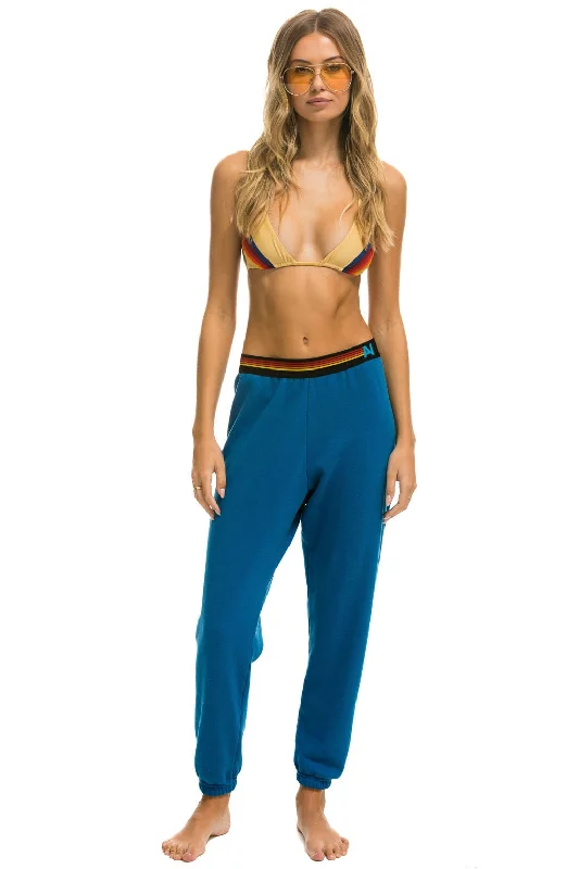 Fashion Wear LOGO STRIPE SWEATPANTS - CARIBBEAN